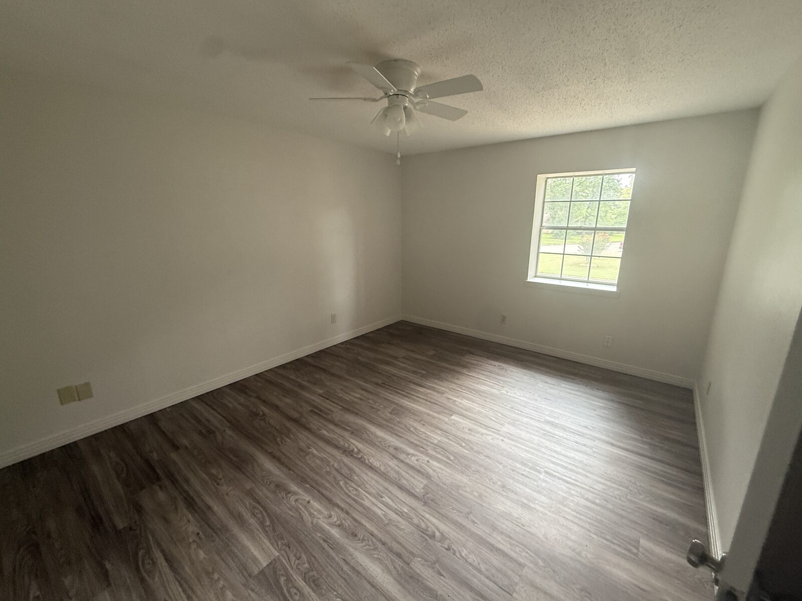 Bedroom with new LVT flooring