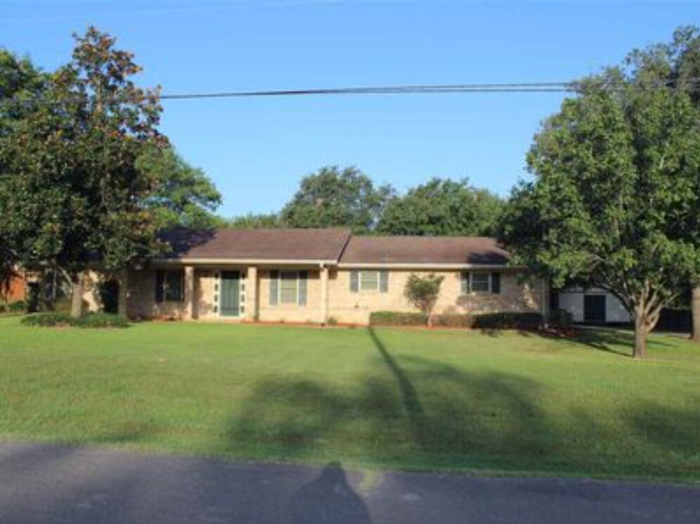 Front exterior & half-acre lot